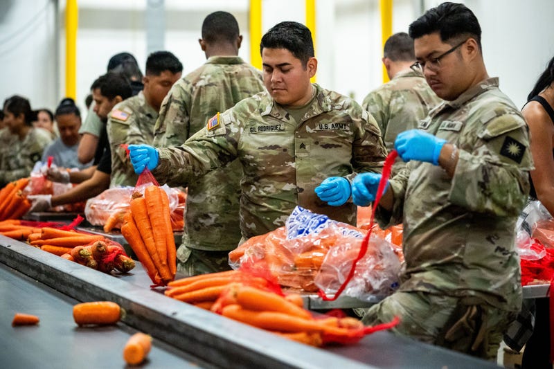 California National Guard sort produce at the Los Angeles Food Bank Wednesday, Oct. 29, 2025, in Los Angeles.