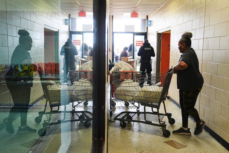 Volunteer Karen Robinson moves groceries during an emergency food distribution at The Jewish Federation of Greater Philadelphia's Mitzvah Food Program in Philadelphia, Friday, Nov. 7, 2025. 