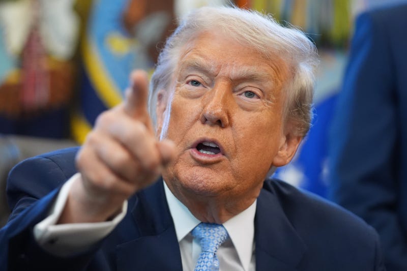 President Donald Trump answers questions from reporters during a meeting with the White House task force on the 2026 FIFA World Cup in the Oval Office of the White House, Monday, Nov. 17, 2025, in Washington.