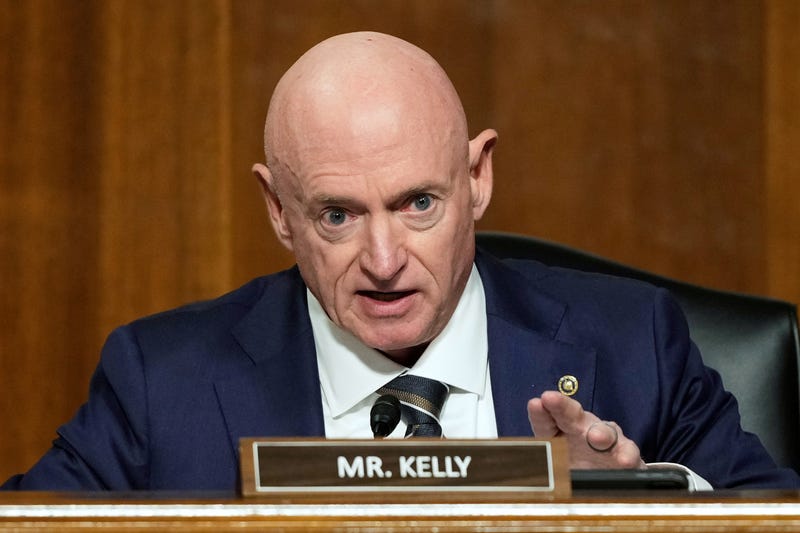 FILE - Sen. Mark Kelly, D-Ariz., speaks during the Senate Armed Services Committee confirmation hearing for Pete Hegseth, President-elect Donald Trump's choice to be Defense secretary, at the Capitol in Washington, Tuesday, Jan. 14, 2025