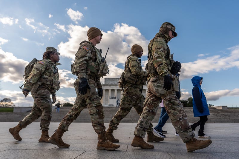 Members of the National Guard patrol in front of the Lincoln Memorial on the National Mall, Friday, Nov. 28, 2025, in Washington.