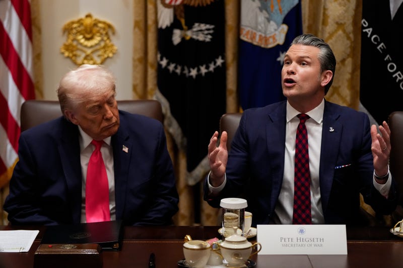 President Donald Trump closes his eyes as Defense Secretary Pete Hegseth speaks during a Cabinet meeting at the White House, Tuesday, Dec. 2, 2025, in Washington.