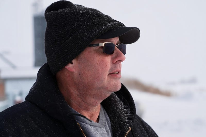 This screenshot taken from video shows Charlie Radman, a corn and soybean farmer, standing on the land his family has owned since 1899, near Randolph, Minn., Wednesday, Dec. 10, 2025. 