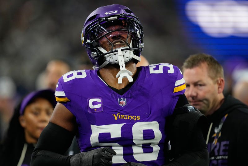 Minnesota Vikings linebacker Jonathan Greenard walks with trainers after an injury during the second half of an NFL football game against the Dallas Cowboys Sunday, Dec. 14, 2025, in Arlington, Texas.