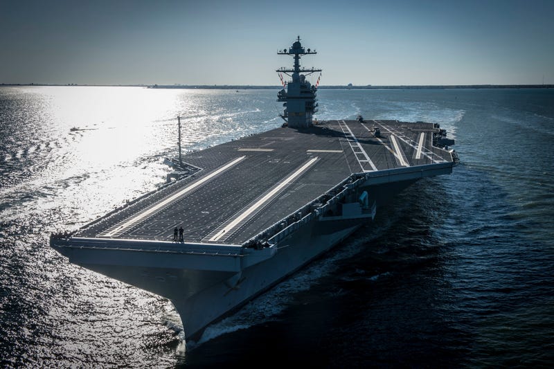 FILE - In this photo provided by the U.S. Navy, the USS Gerald R. Ford embarked on the first of its sea trials to test various state-of-the-art systems on its own power for the first time, April 8, 2017, from Newport News, Va.