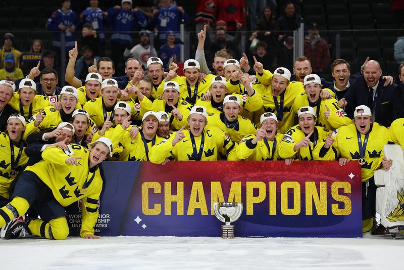 Sweden players celebrate after winning an IIHF World Junior Hockey Championship gold medal game against Czechia, Monday, Jan. 5, 2026, in St. Paul, Minn. 