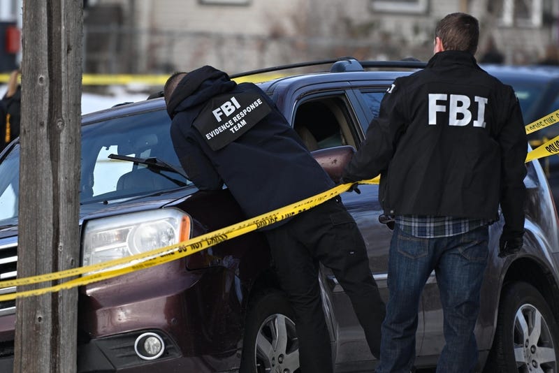 A chaotic scene at 33rdLaw enforcement officers attend to the scene of the shooting involving federal law enforcement agents, Wednesday, Jan. 7, 2026, in Minneapolis. and Portland in South Minneapolis where there are reports that an ICE agent may have shot a person. 