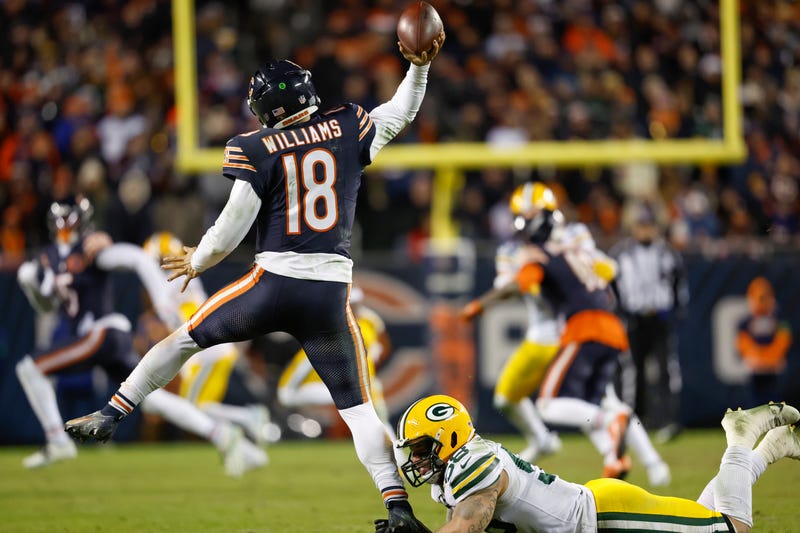 Caleb Williams (18) throws during an wild-card football game against the Green Bay Packers, Saturday, Jan.10, 2026, in Chicago.(AP Photo/Jeffrey Phelps)