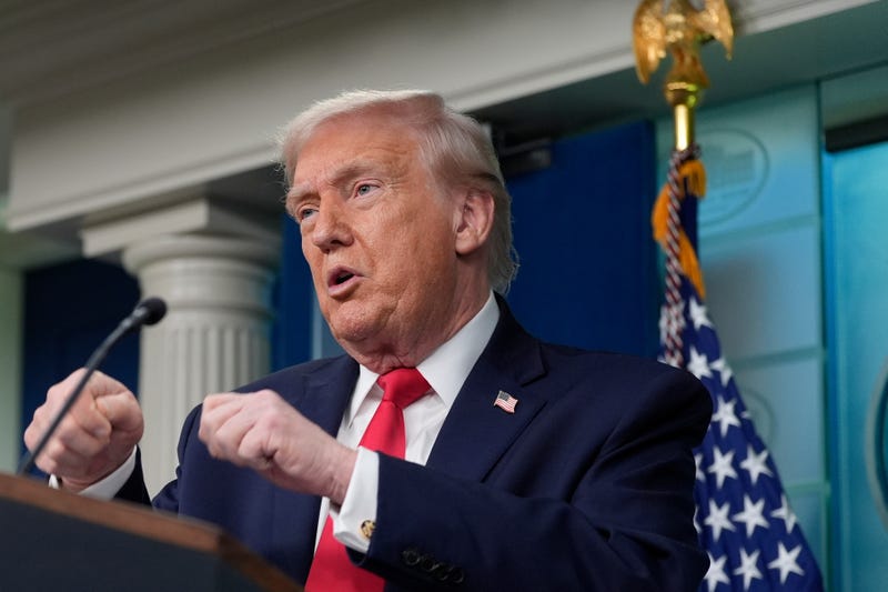 President Donald Trump gestures while he speaks in the James Brady Press Briefing Room at the White House, Tuesday, Jan. 20, 2026, in Washington.