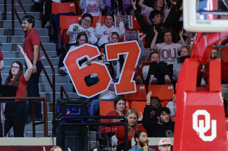 Oklahoma fans hold up a giant 6-7 sign during the second half of a NCAA college basketball game against South Carolina Thursday, Jan. 22, 2026 in Norman, Okla.