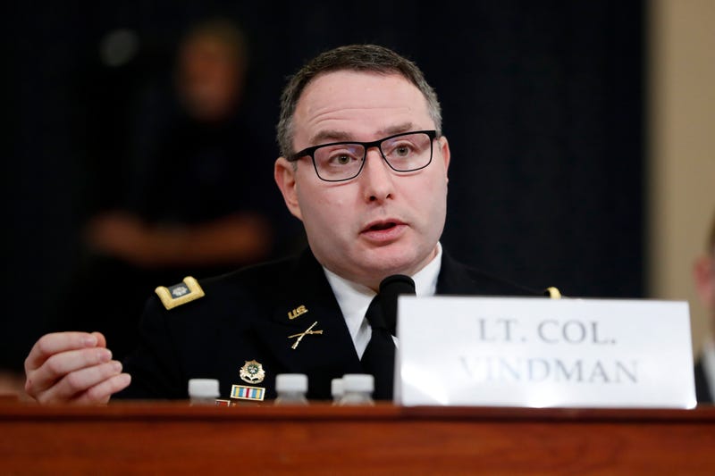 FILE - National Security Council aide Lt. Col. Alexander Vindman testifies before the House Intelligence Committee on Capitol Hill in Washington, Nov. 19, 2019, during a public impeachment hearing of President Donald Trump's efforts to tie U.S. aid for Ukraine to investigations of his political opponents.