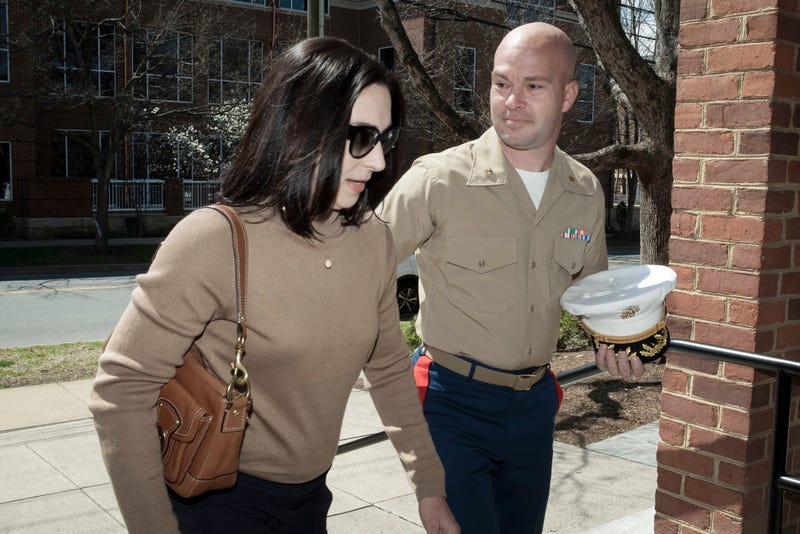 FILE - Marine Maj. Joshua Mast and his wife, Stephanie, arrive at Circuit Court, Thursday, March 30, 2023 in Charlottesville, Va.