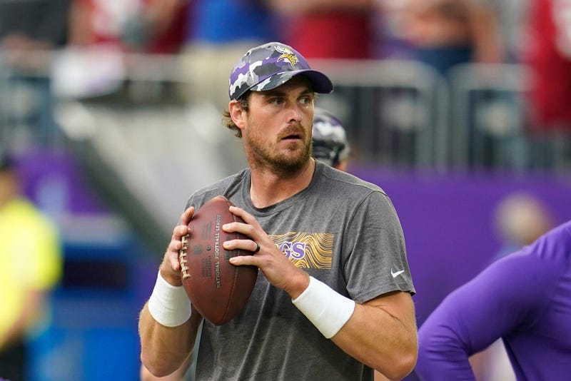 FILE - Minnesota Vikings quarterback Sean Mannion warms up before a preseason NFL football game against the San Francisco 49ers, Aug. 20, 2022, in Minneapolis. (AP Photo/Abbie Parr, File)