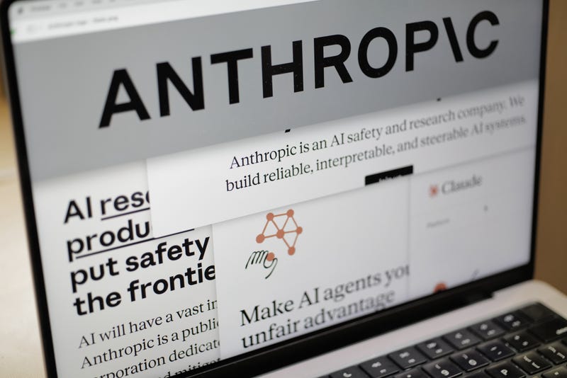 Pages from the Anthropic website and the company's logo are displayed on a computer screen in New York on Thursday, Feb. 26, 2026.