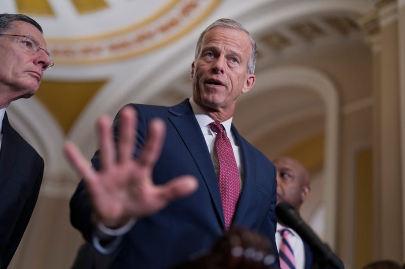 Senate Majority Leader John Thune, R-S.D., center, joined at left by Sen. John Barrasso, R-Wyo., the GOP whip, speaks to reporters at the Capitol in Washington, Tuesday, March 3, 2026.
