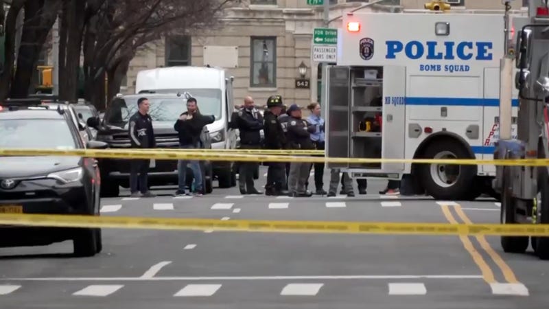 In this image taken from video, law enforcement officers respond to Manhattan's Upper East Side as New York City's police said they had identified a "suspicious device in a vehicle,” Sunday, March 8, 2026, in New York. 