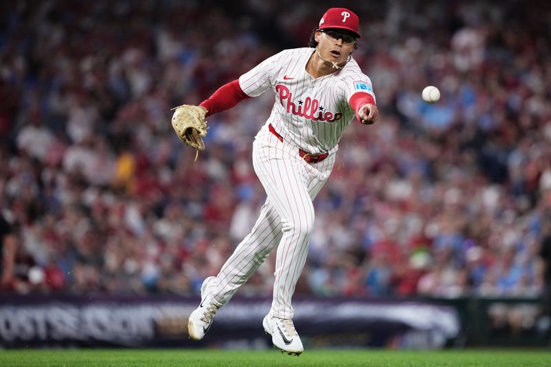 Philadelphia Phillies starting pitcher Jesús Luzardo throws out Los Angeles Dodgers' Teoscar Hernandez at first during the fourth inning in Game 2 of baseball's National League Division Series, Oct. 6, 2025, in Philadelphia. 