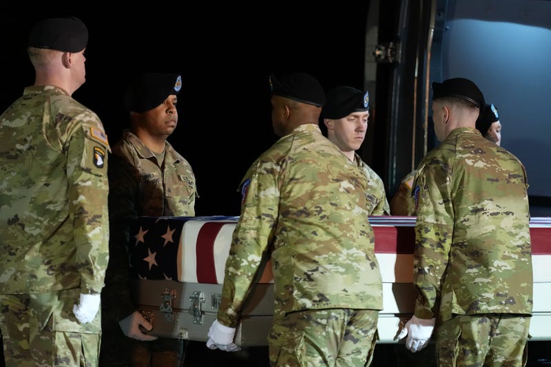 A U.S. Army carry team places the transfer case with the remains of U.S. Army Sgt. Benjamin N. Pennington, 26, of Glendale, Ky., the seventh U.S. service member to die in combat during the Iran war, in the the transfer vehicle during a dignified transfer Monday, March 9, 2026, at Dover Air Force Base, Del.