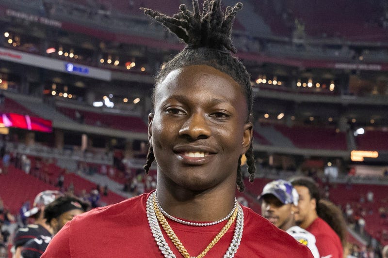 Arizona Cardinals' Marquise "Hollywood" Brown smiles after a preseason NFL football game against the Baltimore Ravens, Aug. 21, 2022, in Glendale, Ariz.