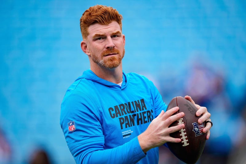 Carolina Panthers quarterback Andy Dalton (14) warms up before an NFL football game between the Carolina Panthers and the Dallas Cowboys on Sunday, Oct. 12, 2025, in Charlotte, N.C. 