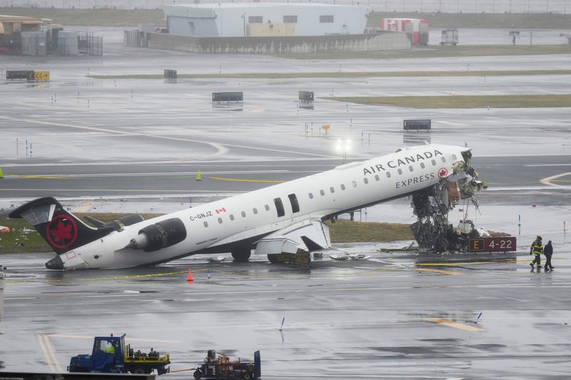 The smashed plane was seen on the tarmac on Monday, March 23