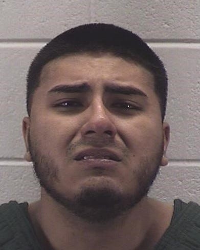 Aurora man charged with strangling woman