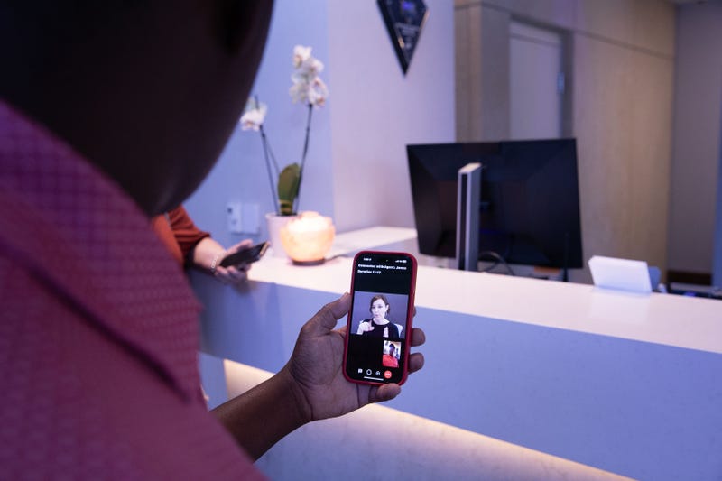 A hearing-impaired travel uses the ASL app