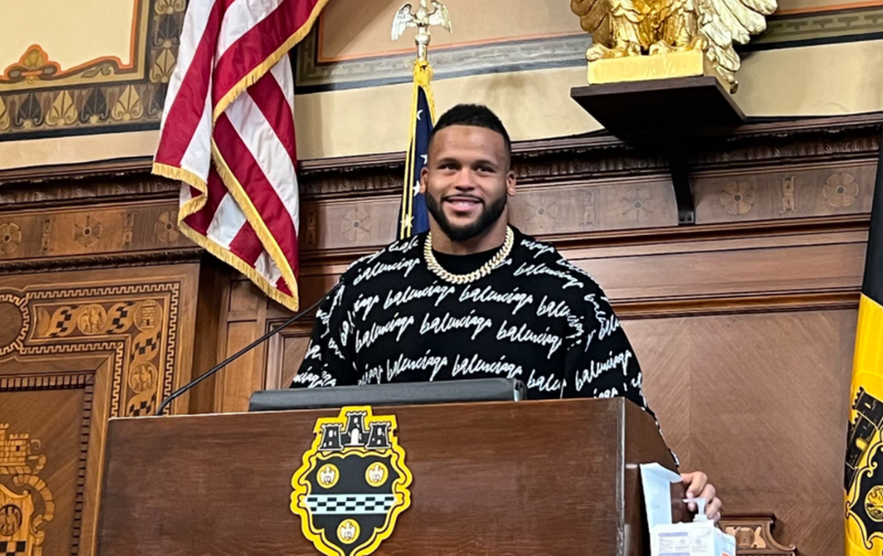 Aaron Donald accepting a proclamation for Aaron Donald Day