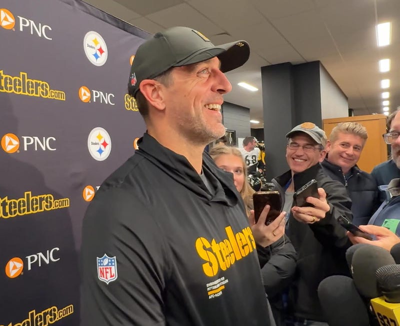 Aaron Rodgers laughing in news conference