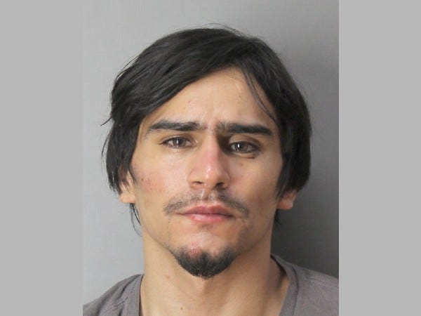 Alexis Aleman of Queens is charged with resisting arrest, menacing a police officer, assault and criminal possession of a weapon.