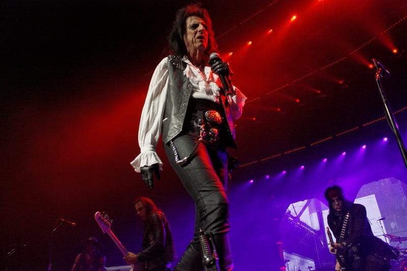 Alice Cooper walking across stage