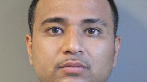 Man arrested for impersonating a police officer before robbing woman on Long Island