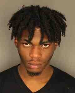 Amauri Smith of Rochester has been charged with carrying a gun while taking part in the March for Our Lives event this past weekend.