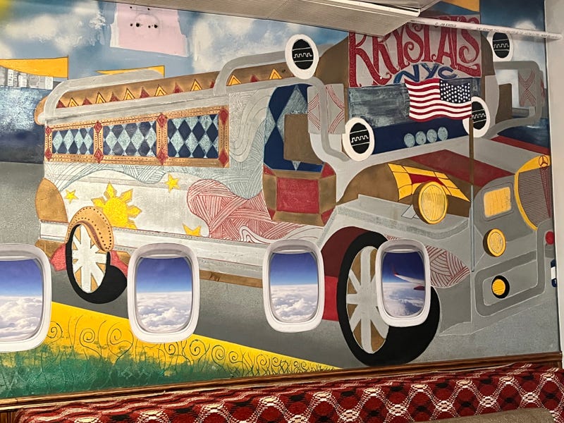 A Filipino American-themed mural inside Amazing Grace