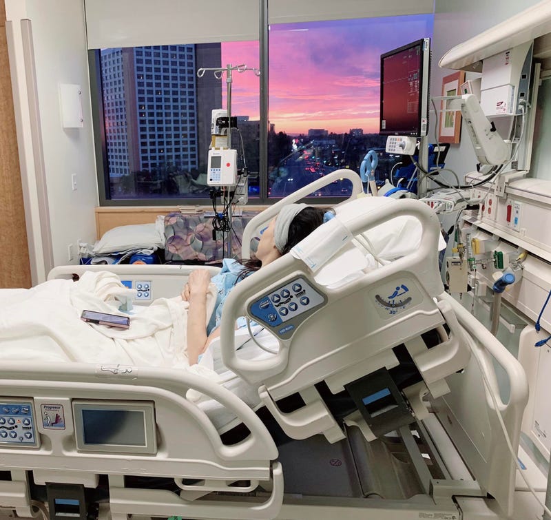 Ana in the hospital bed.
