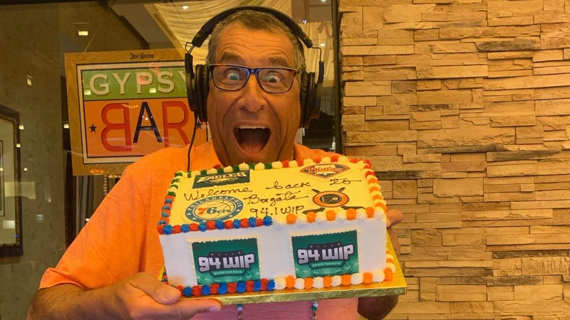 Angelo Cataldi holds cake