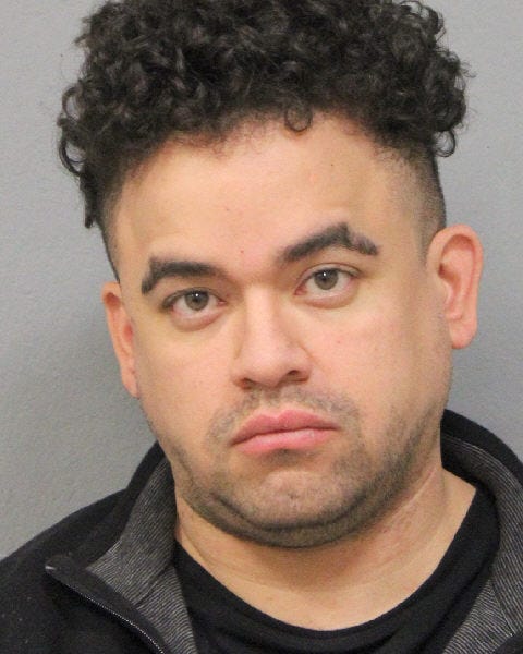Anthony Beltran, 33, was arrested and charged after a woman was shot at while driving on Long Island Sunday night.