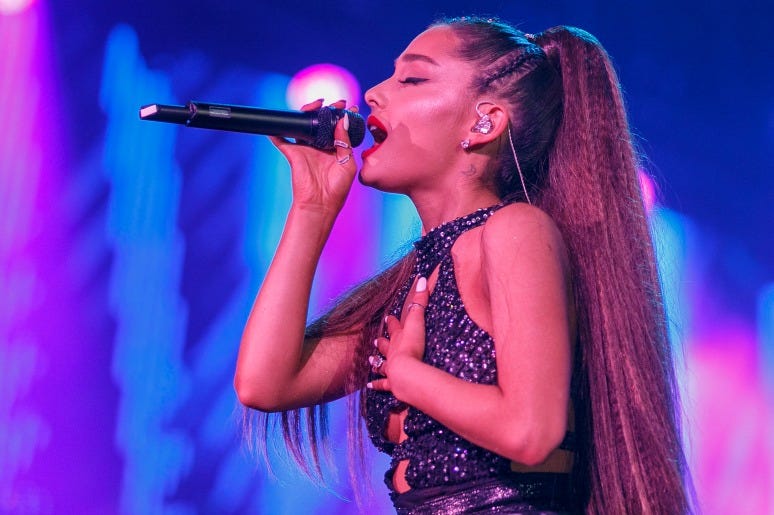 Ariana Grande performs onstage