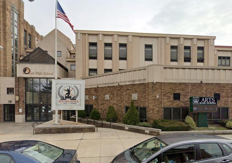 Two women are in critical condition after a car crash outside Arts High School sent one car into the high school wall, and struck the victims.