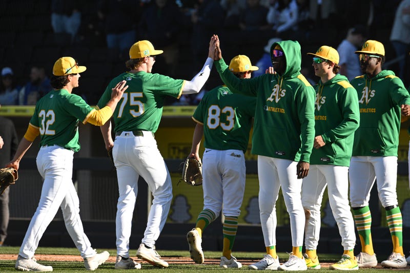 Members of the Athletics celebrate defeating the Arizona Diamondbacks 4-2 in a spring training game at Las Vegas Ballpark on March 08, 2025 in Las Vegas, Nevada.
