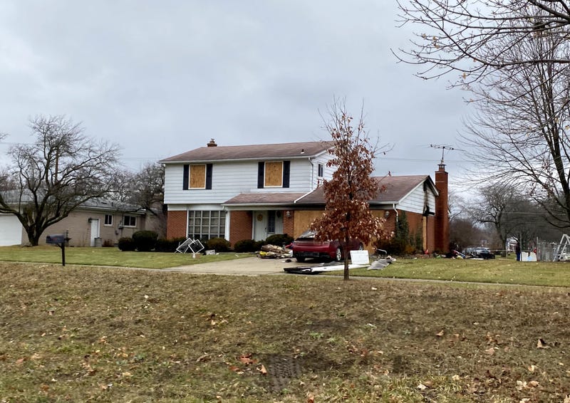 What remains of a Livonia home after a raging fire broke out Friday night and killed its sole resident