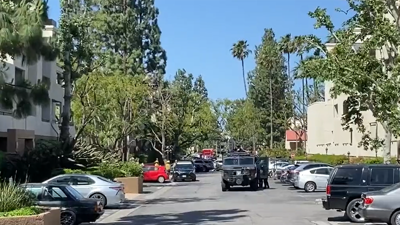 The Los Angeles Police SWAT team at Woodland Hills, Calif. apartment complex on April 7, 2022, responding to a barricade situation that allegedly involves and armed suspect.