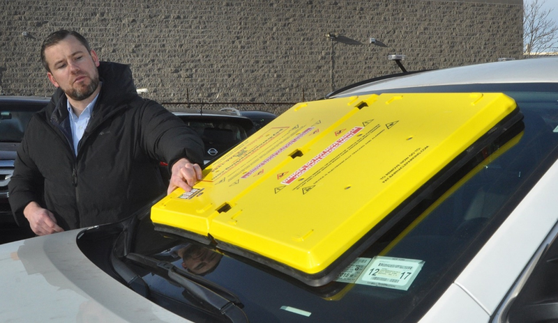 A barnacle on a car windshield.
