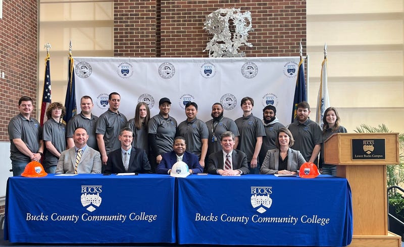 Current students enrolled in the Bucks County Community College Pre-Apprenticeship Industrial Maintenance Training and Pre-Apprenticeship Metalwork Training programs with members of Bucks County Community College leadership and representatives from the Philadelphia Building & Construction Trades Council.