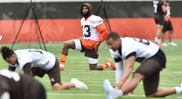Odell Beckham Jr. stretches during minicamp at the Cleveland Browns training facility on June 4, 2019. 