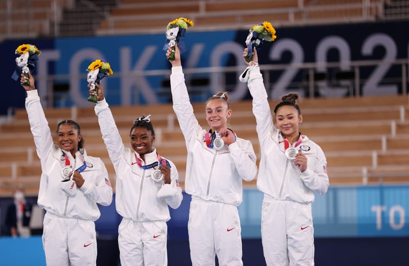 Gymnasts Jordan Chiles, Simone Biles, Grace McCallum and Sunisa Lee of Team USA after winning the silver medal during the Women's Team Final at the Tokyo 2020 Olympic Games, 7/27/21