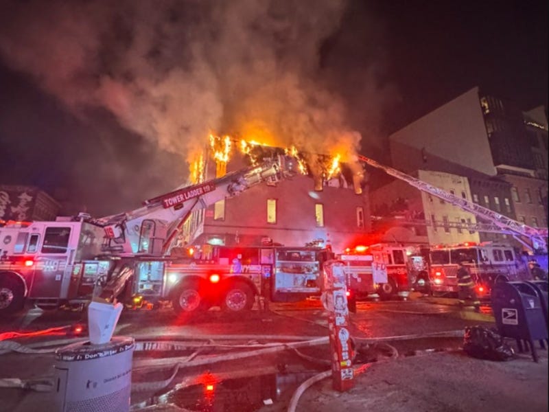 A 4-alarm fire burned at 335 Graham Ave. in Williamsburg, Brooklyn on Saturday night and extended to two adjoining buildings.