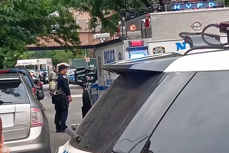 The NYPD Bomb Squad responded to the 25th Precinct in Manhattan after an "explosive device" was found in a vehicle following a domestic dispute.