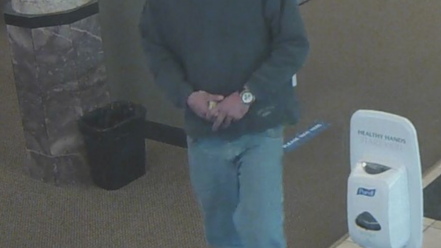 Man wanted for robbing Aurora bank