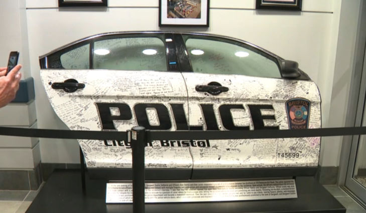 Two police cruiser doors are featured in a new memorial for Bristol police officers Dustin DeMonte and Alex Hamzy